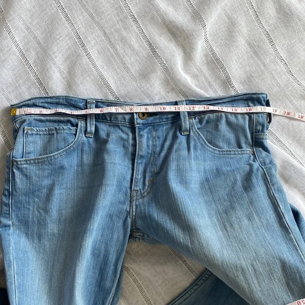 Levi light wash low flare denim. - Image 11