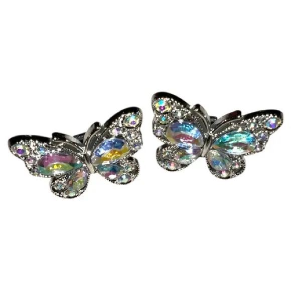 Pretty silver sparkly iridescent butterfly show clips. These are plastic. Size undefined - Image 6