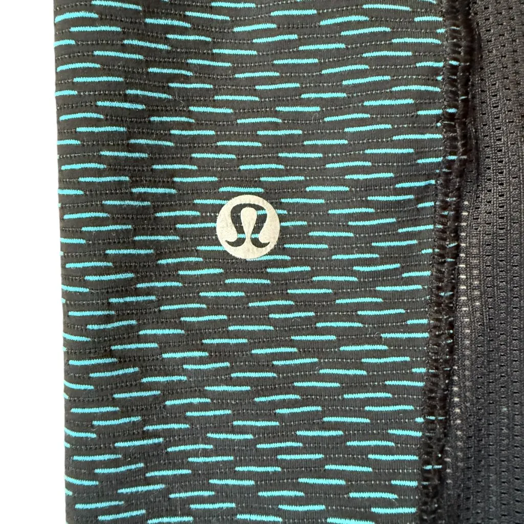 Lululemon turquoise and black cropped compression athletic pants with pockets - Image 9