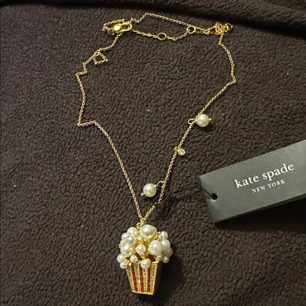Kate Spade Carnival pendant showcases a faux pearl-embellished popcorn charm. - Image 6