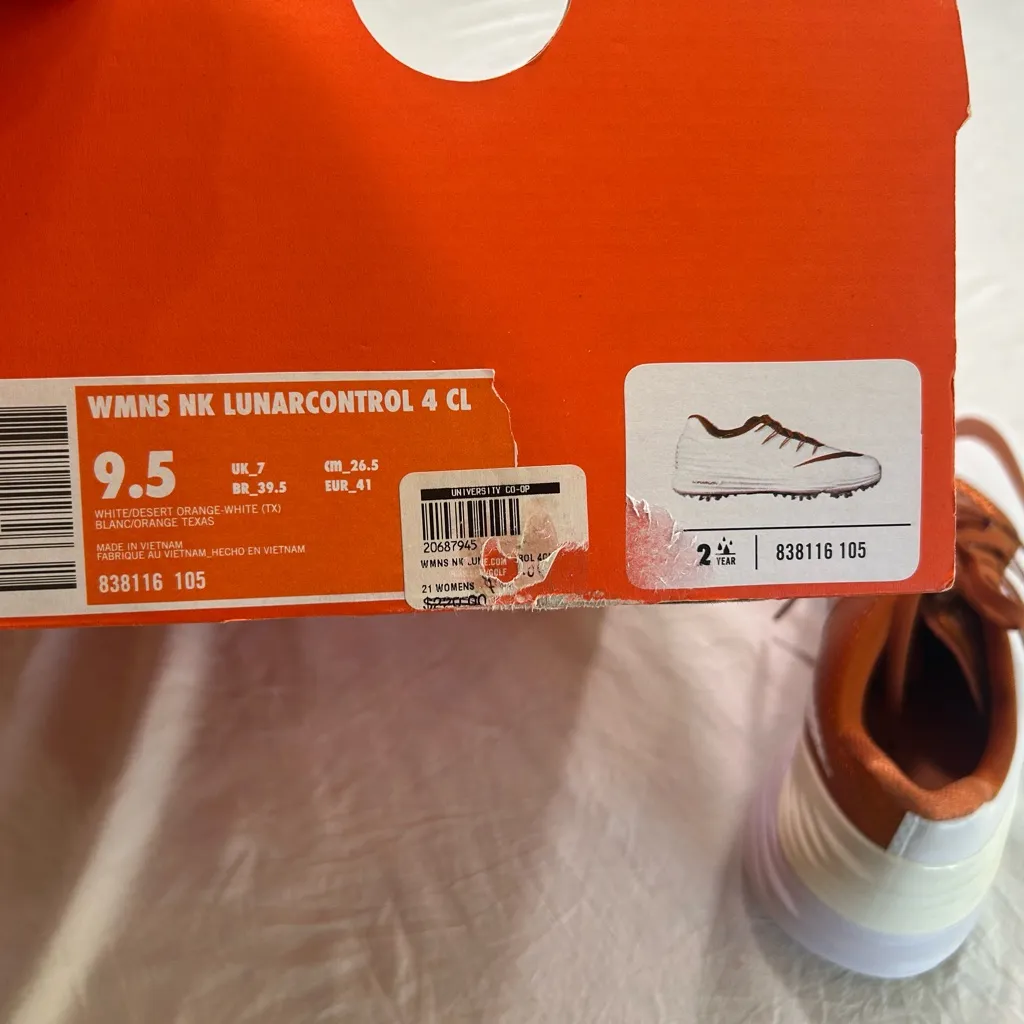 Nike woman’s White and Orange Athletic Shoes - Image 4