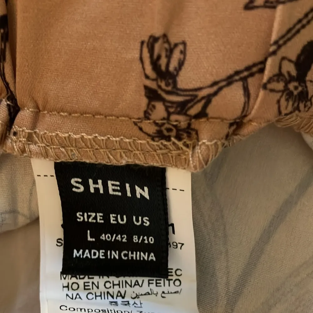 Resort style high waist loose fit Botanical print layered ruffle hem skirt NWOT Black Size undefined - Image 6