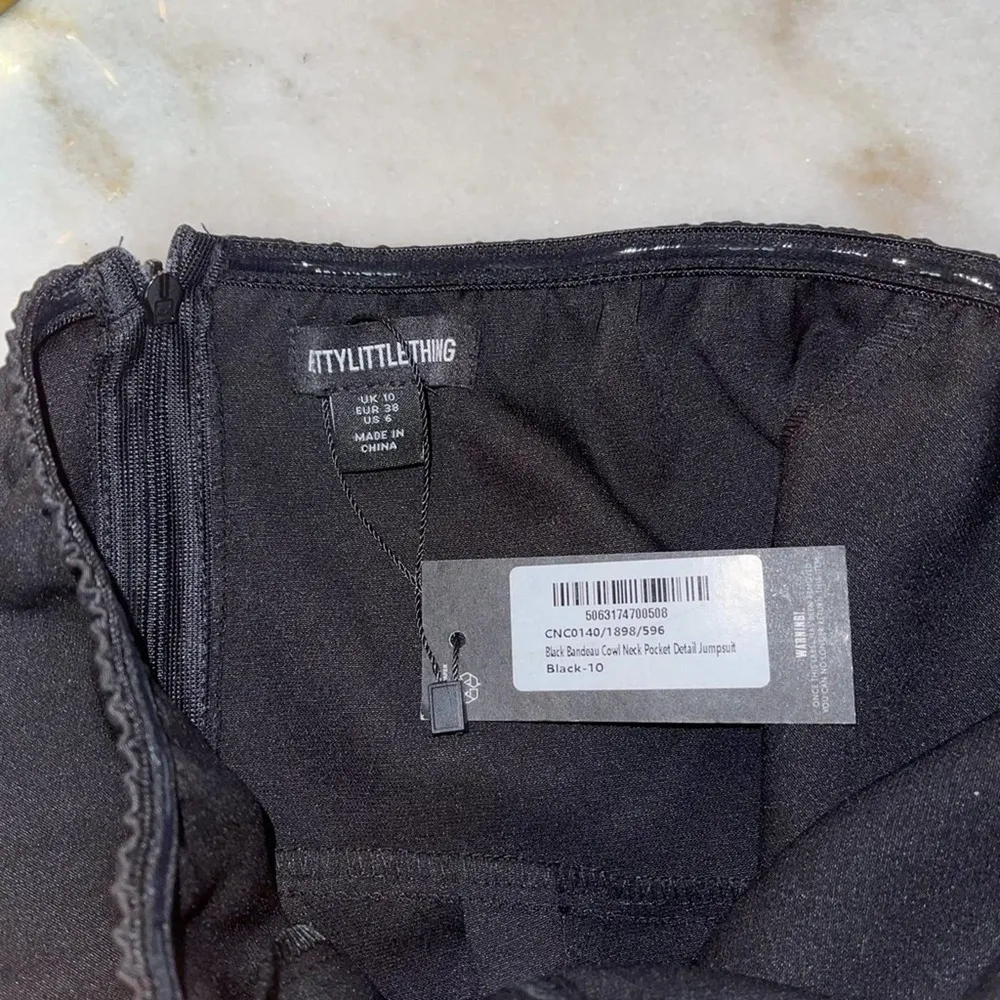 PrettyLittleThing Black Bandeau Cowl Neck Pocket Detail Jumpsuit - Image 9