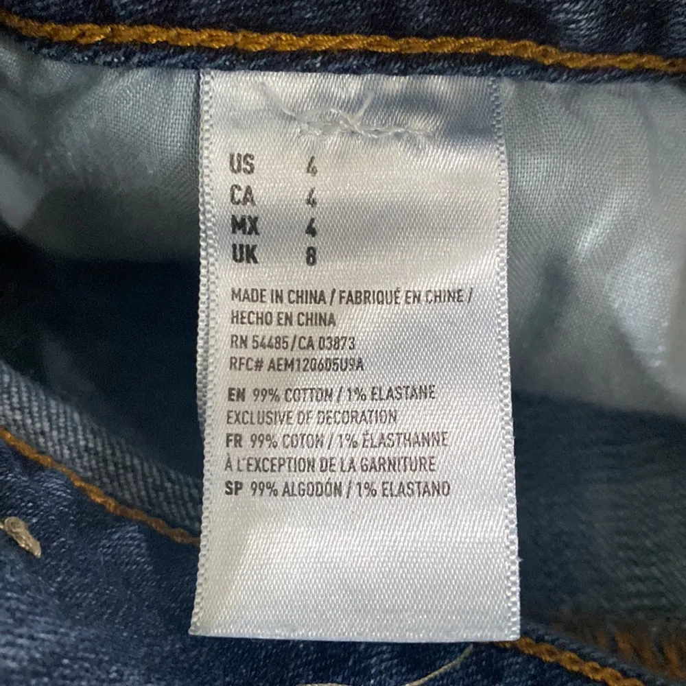 American Eagle Super Stretch denim midi cuffed shorts with distressed hem size 4 - Image 9