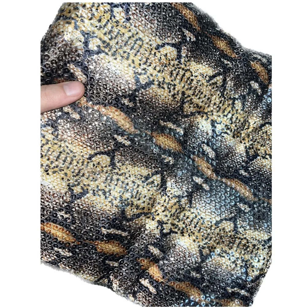 BCBGmaxazria White Glossy Sequined Styled Lazy Clutch in Animal Print Background - Image 6