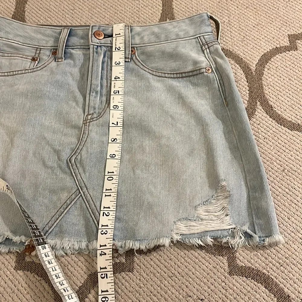 American Eagle Outfitters distressed light wash mini denim skirt - Image 15