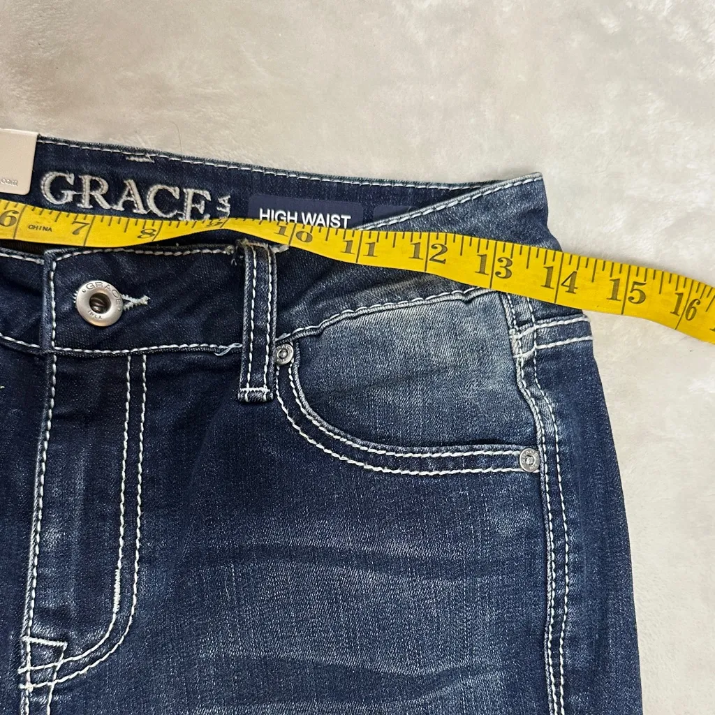 Grace Dark Blue Flare Jeans with Patterned Hem and Leg Size 27 - Image 9