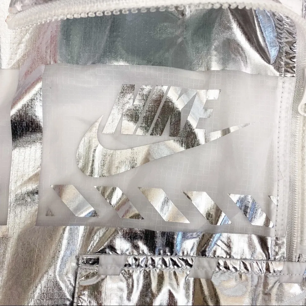 Nike Sportswear Metallic All Over Logo Print Windbreaker Jacket: Silver/White - Image 12