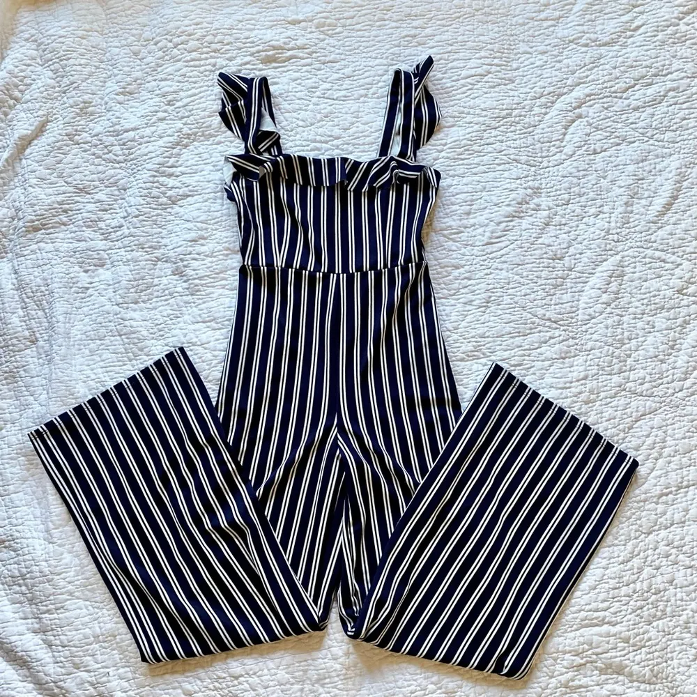 Sleeveless Ruffled Navy and White Striped Jumpsuit - Image 2