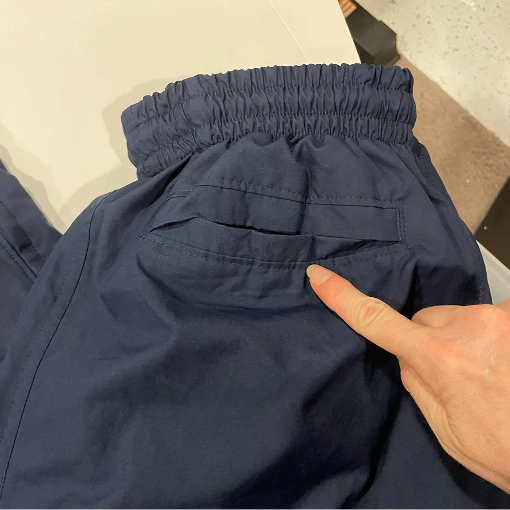 Navy blue Nike ankle zip lined track pants elastic waist oversized pockets - Image 15