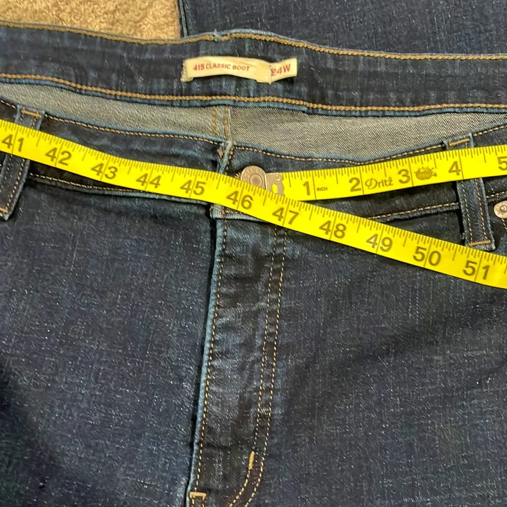 Levi’s dark denim 415 classic boot cut 30 inch inseam high rise - Image 5