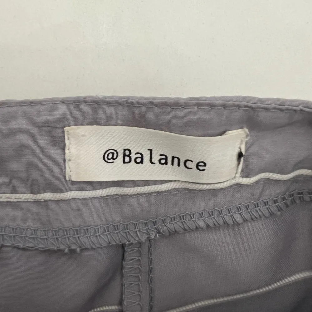 Balance Collection Gray Striped Romper wrap front V neck. - Image 2