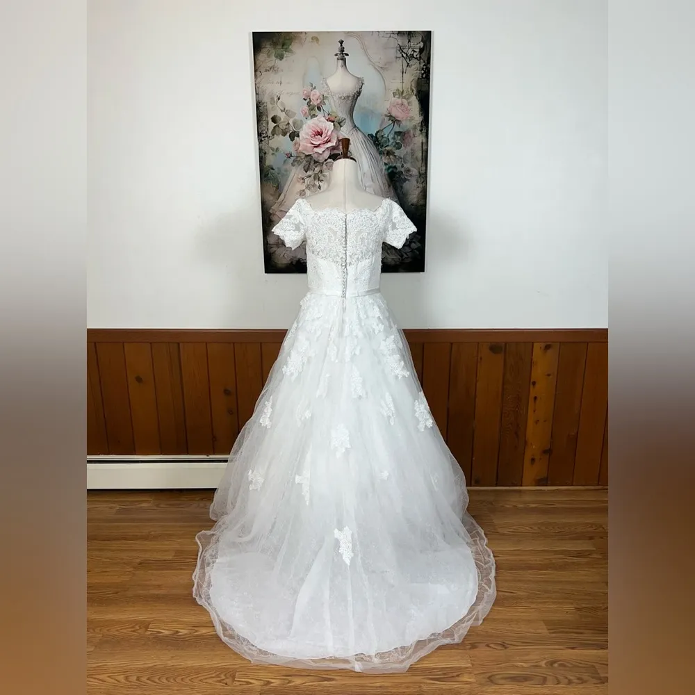 Elegant Jewel by David’s Bridal Off-Shoulder Lace Wedding Gown! - Image 5