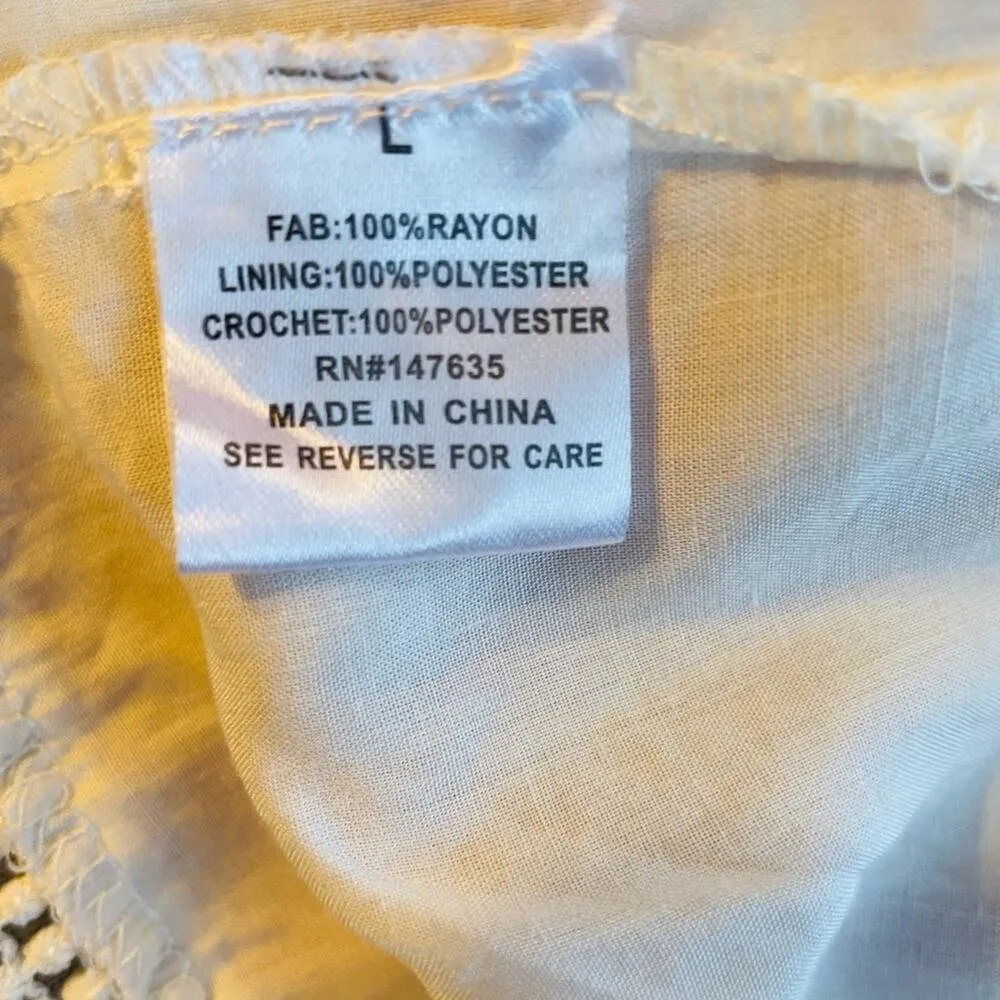 Romeo & Juliet Couture white cold shoulder elastic waist fringe mini dress - Image 3