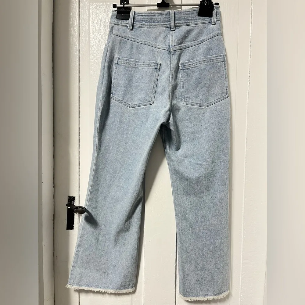 Apiece apart light wash high waisted  cropped frayed hem denim jeans - Image 3