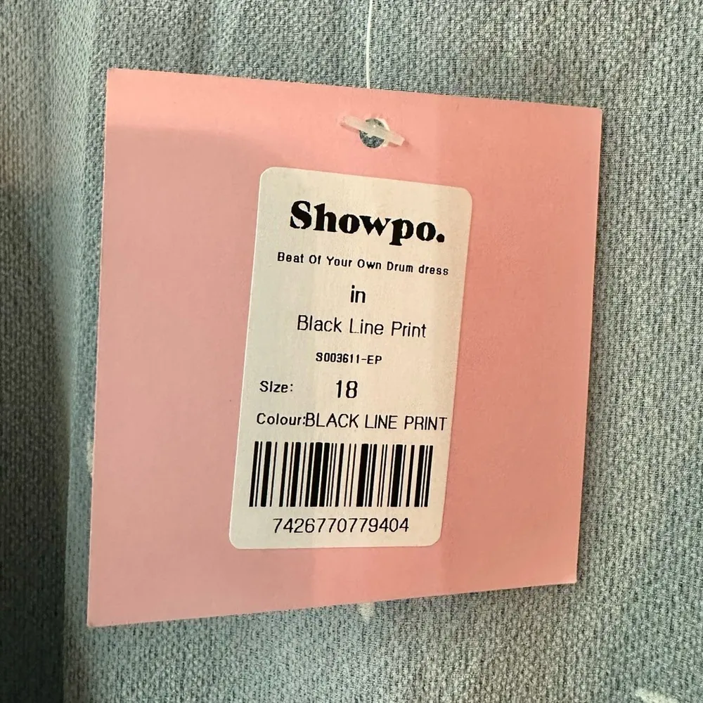 NWT Showpo Beat Of Your Own Drum Dress in Black Line Print Wrap Dress - Image 4