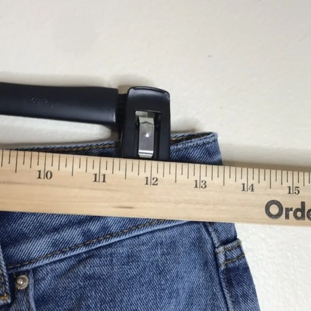 Khaki + blue ladies cut off denim shorts with daisies print size 28 - Image 5