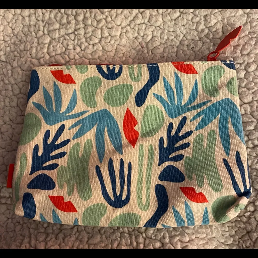 IPSY Force of Nature travel size cosmetics bag (red,green and blue leaf design) - Image 1
