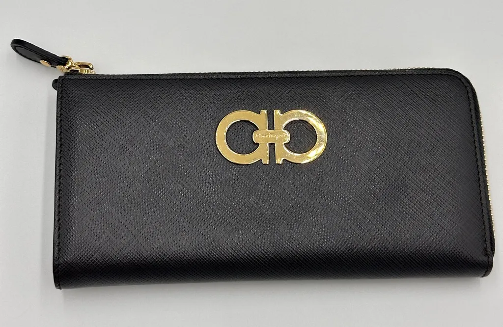 -FERRAGAMO
Dark Gray Leather Zip Around Wallet Excellent condition. - Image 1