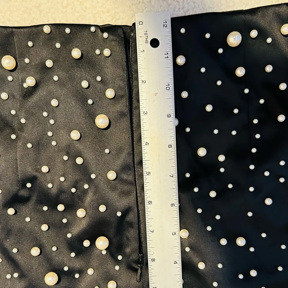 H&M Short black A-line skirt in satin-feel fabric with white plastic pearls. - Image 14