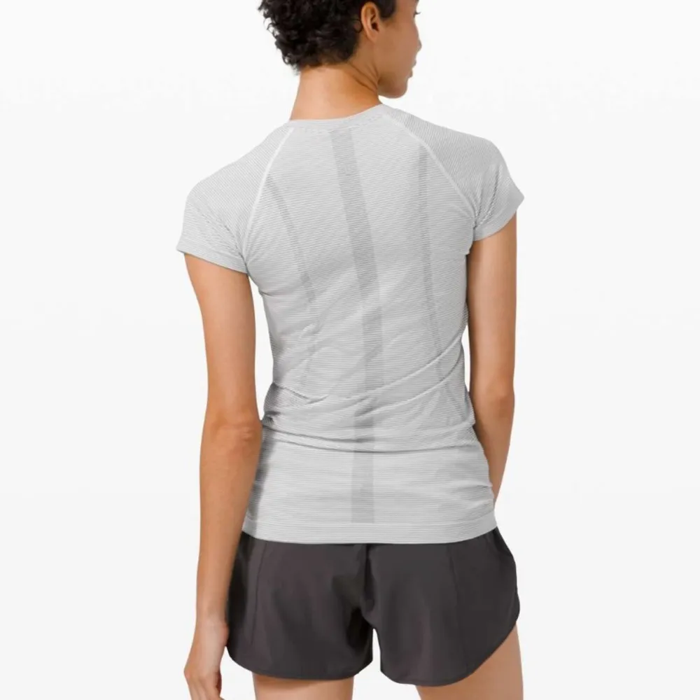 Lululemon  Swiftly Tech Short Sleeve 2.0
Tempo Stripe White / Black
Size 10 - Image 4
