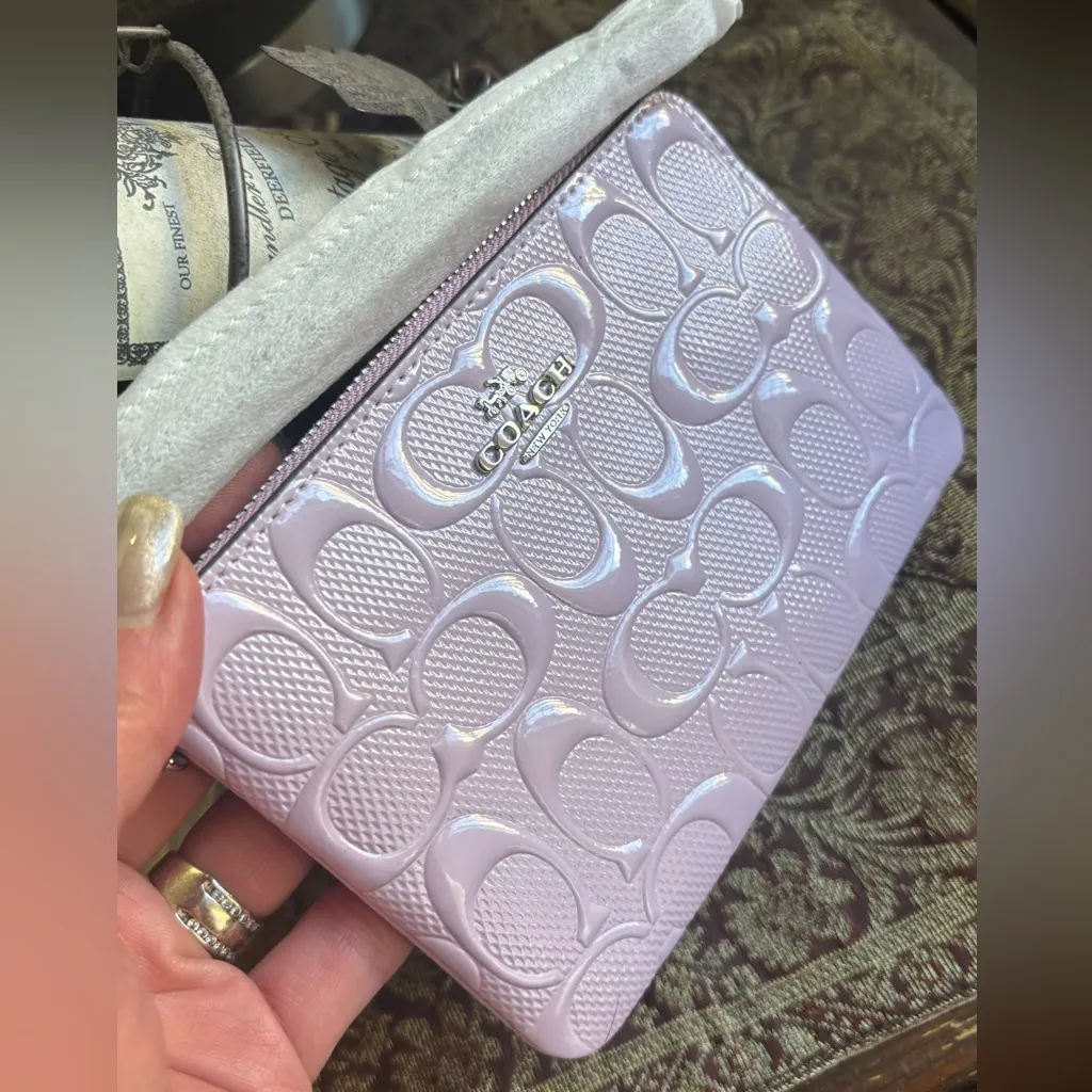 Authentic COACH patent signature leather zip top wristlet with a heart charm - Image 11