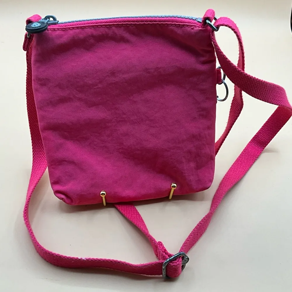A Cute Bright Pink 3 Zip Nylon Kipling Crossbody Handbag With Monkey - Image 2