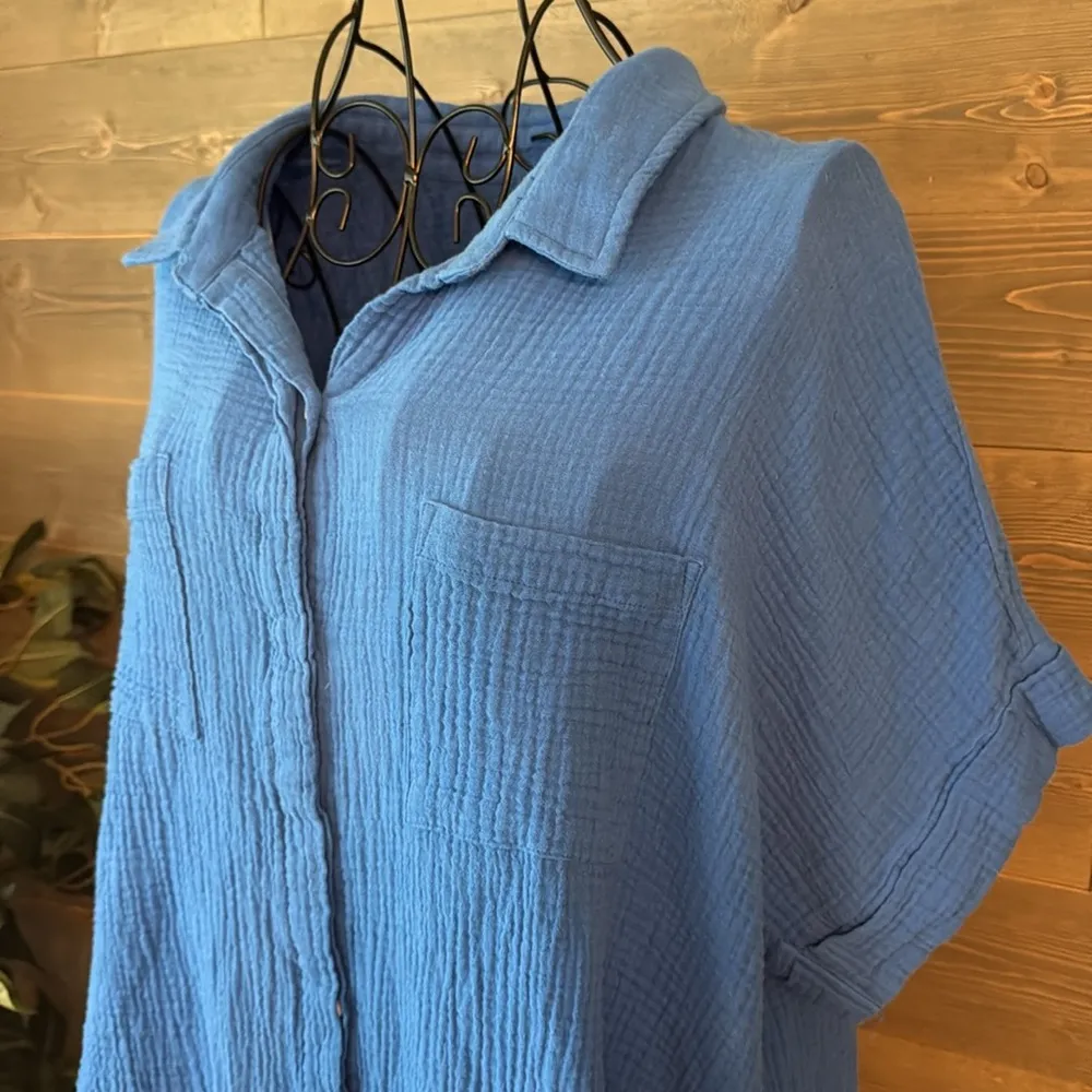 143 story by lineup, short sleeve collared, button - Image 2