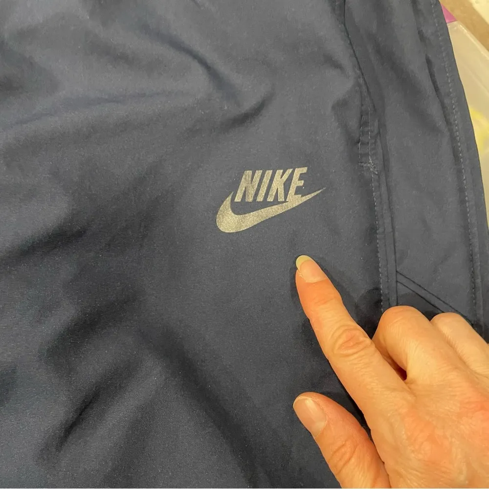 Navy blue Nike ankle zip lined track pants elastic waist oversized pockets - Image 16