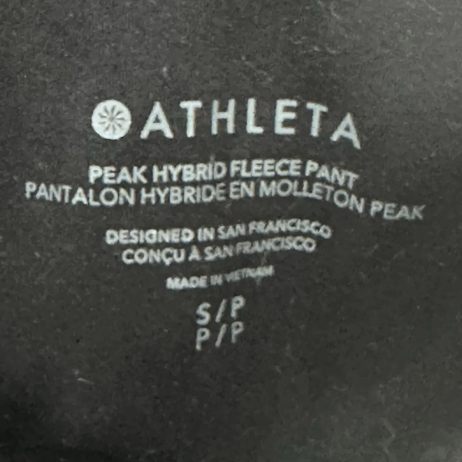 Athleta‎ Peak Hybrid Fleece Flare Pants Women's Size Small Black Zip Pockets - Image 7