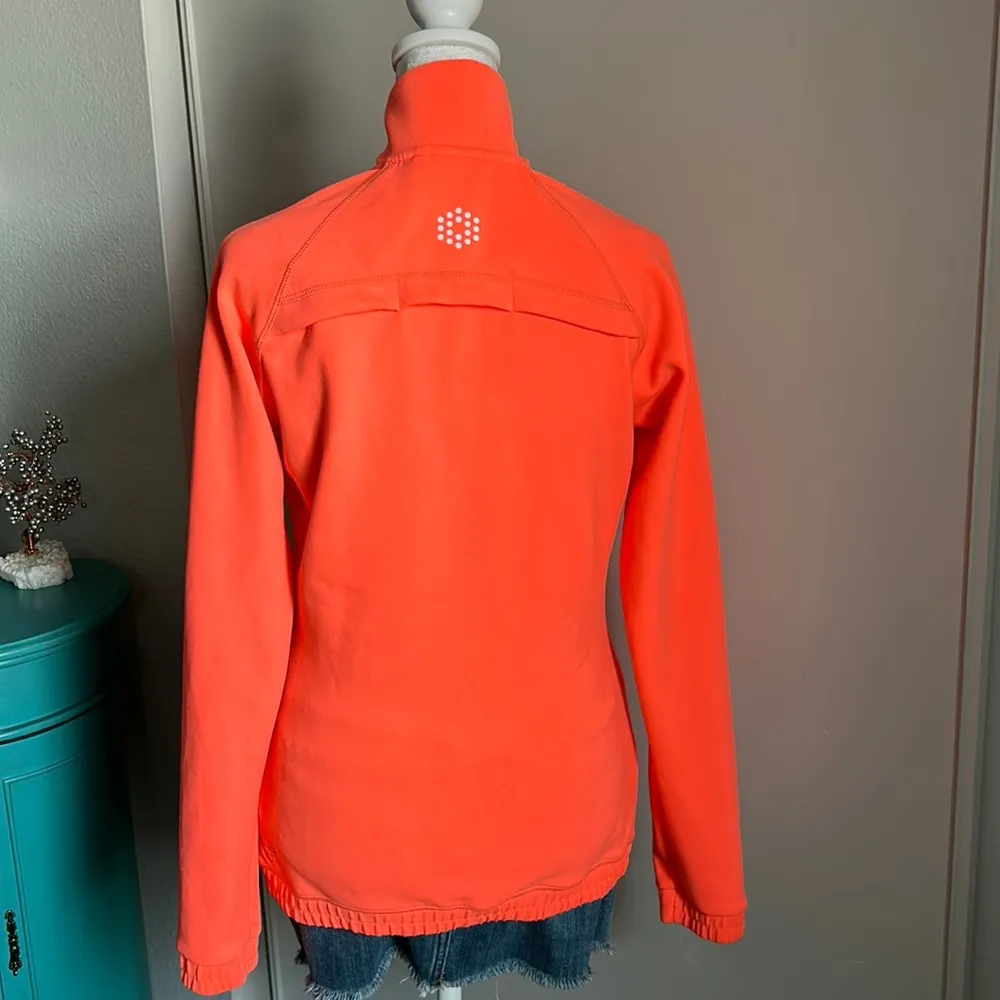 Puma Women’s Lightweight Leisure Athletic Hooded Zip Up Neon Orange Jacket - Image 6