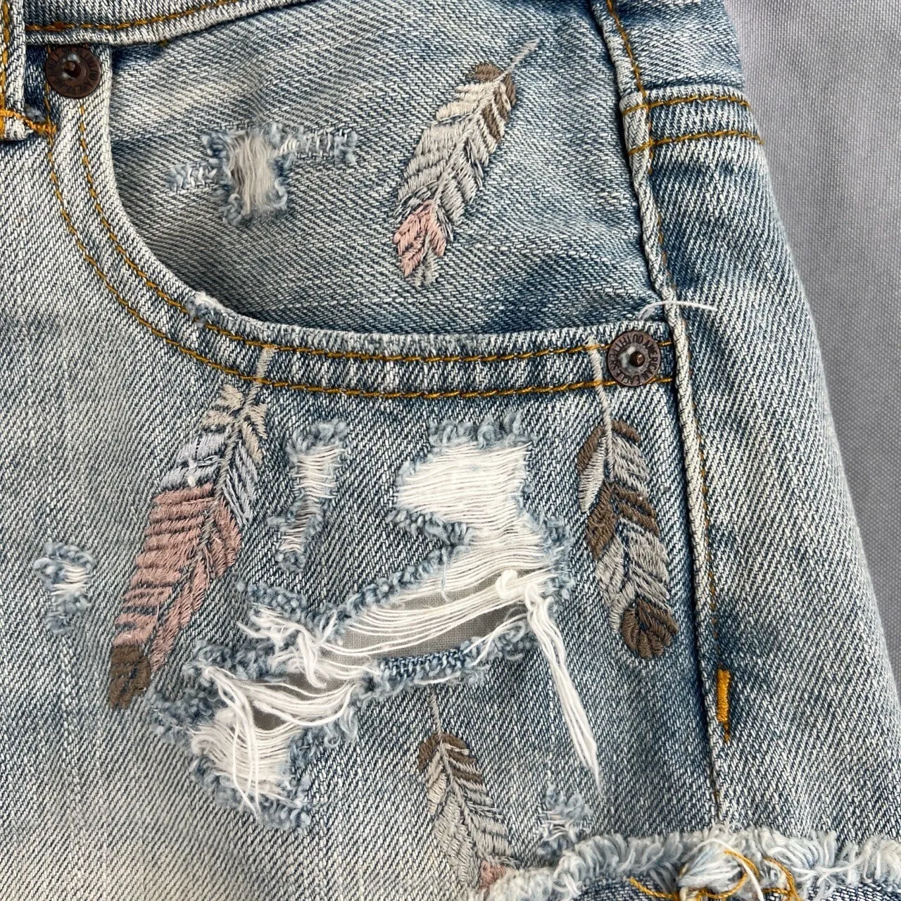AEO Jean Short Blue Distressed Embroidered Feathers Hem Hi-Rise Festival Size 2 - Image 10