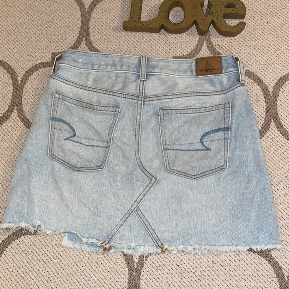 American Eagle Outfitters distressed light wash mini denim skirt - Image 11