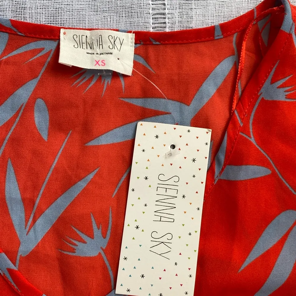 Sienna Sky NWT peplum blouse with flutter sleeves. - Image 3