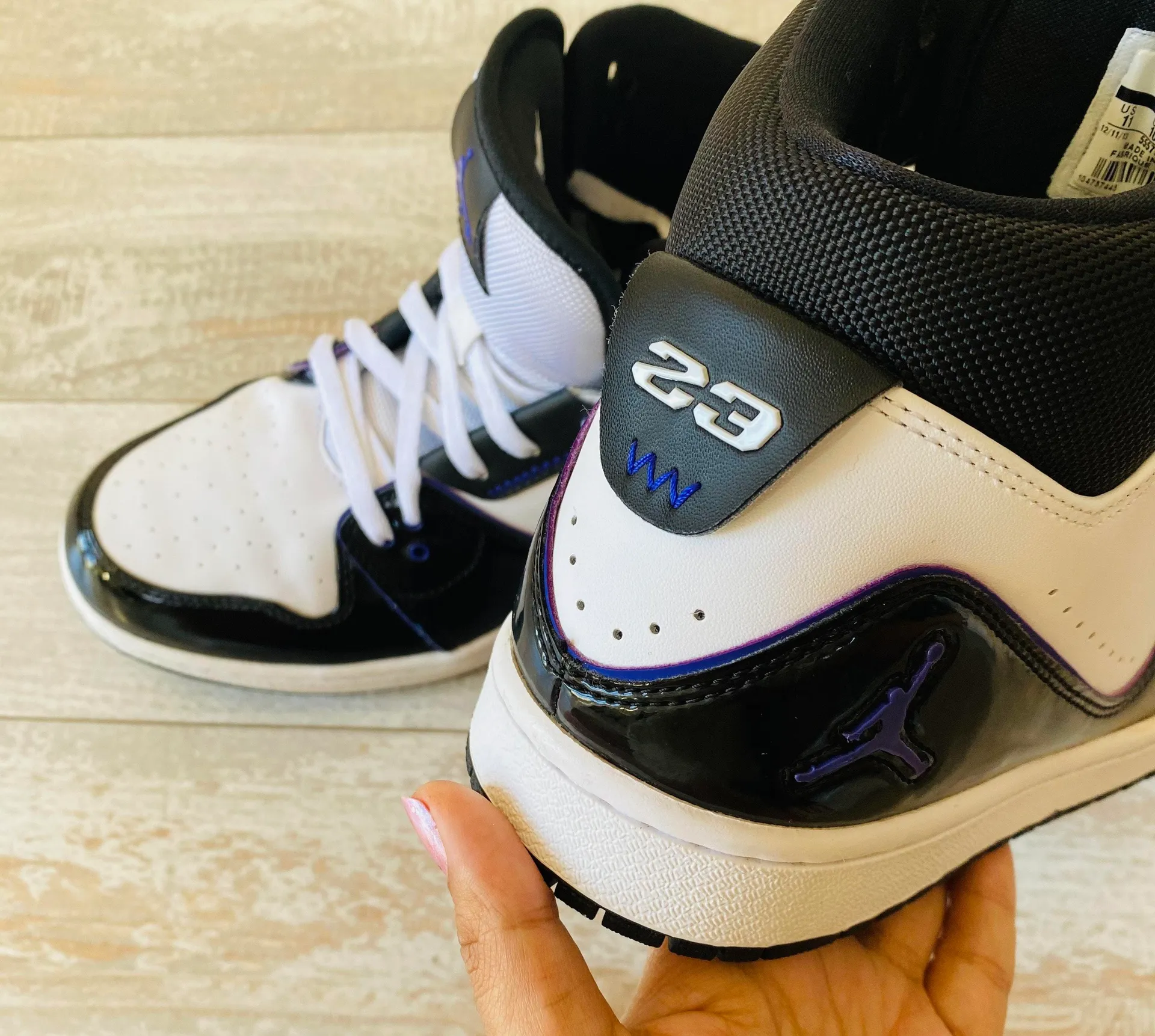 Air Jordan Black and Purple High Top Sneakers - Image 6