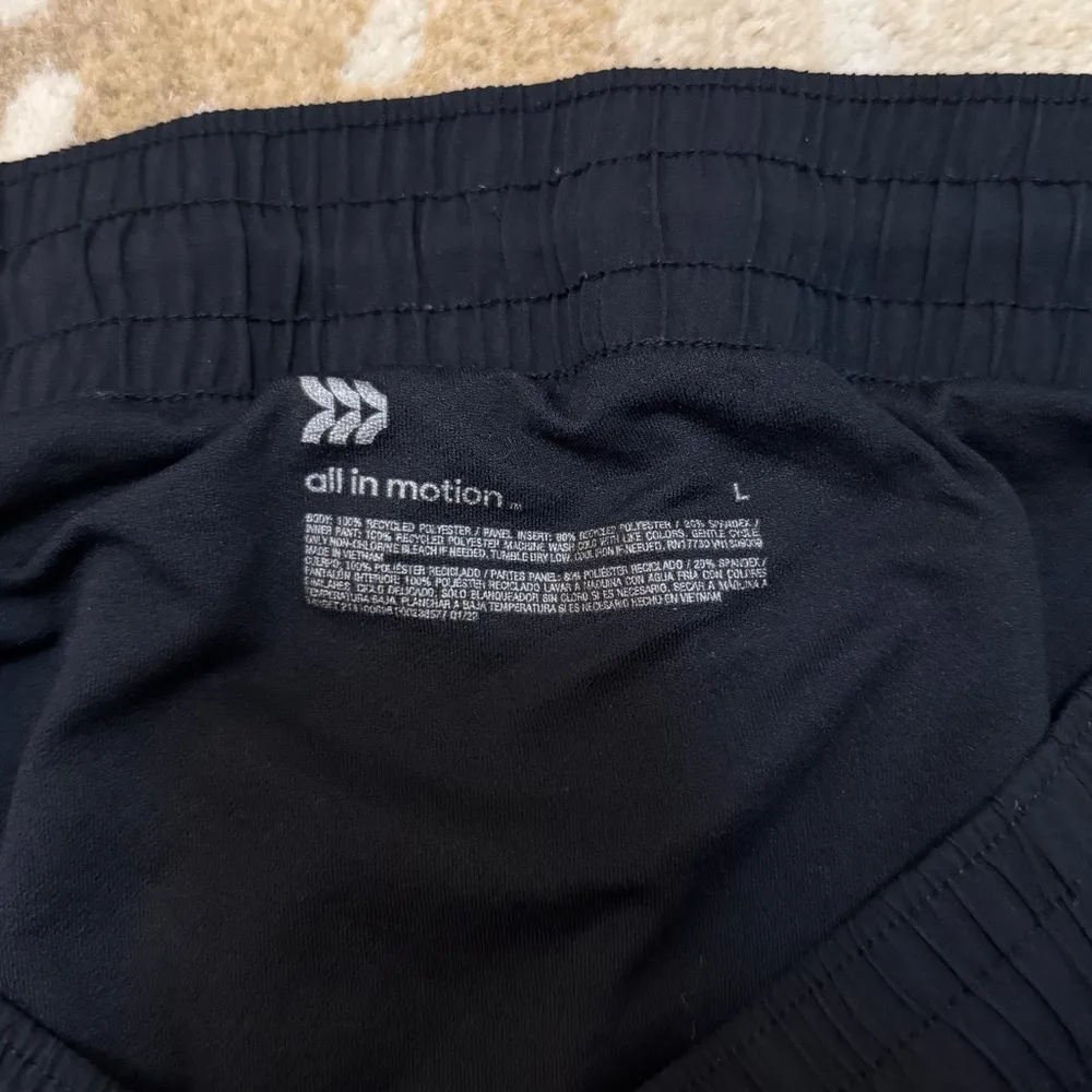 Target All in Motion black reflective athletic shorts women’s size large - Image 6