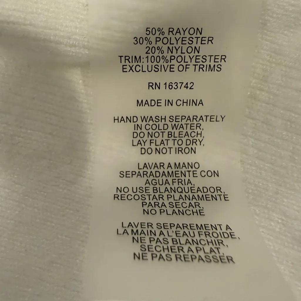 LIV Milano White Sweater with semi sheer sleeves V - Image 4