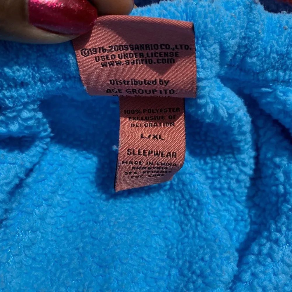 Sanrio 2000s Hello Kitty fleece plush bathrobe sky blue bow winking kissy face Size L - Image 4