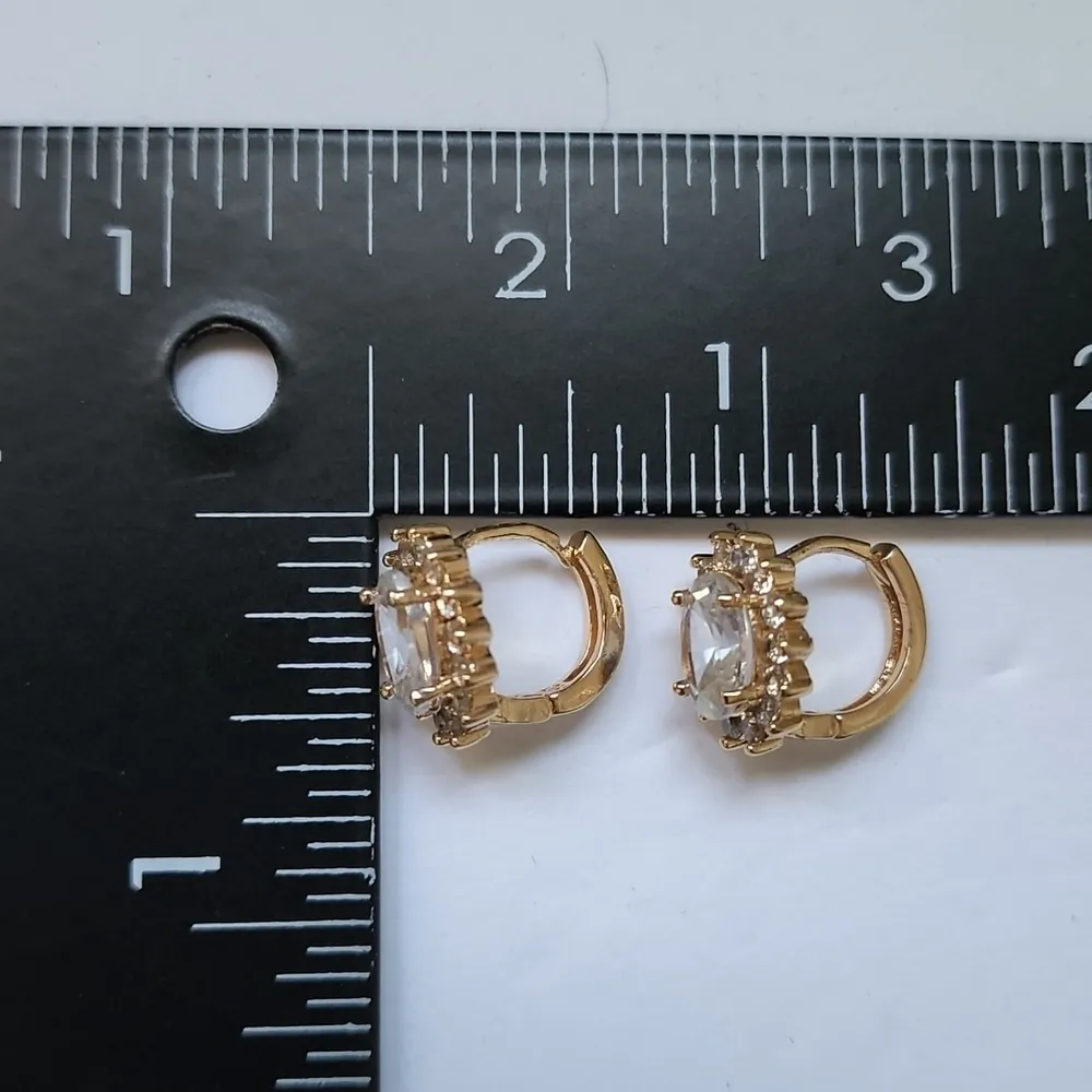 Gold with Clear Cubic Zirconia Oval Huggie Earrings - Image 4