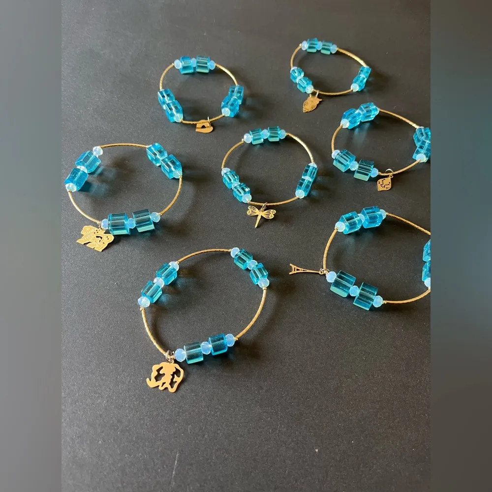 7 Piece Gold Charm Blue Crystal Beads Layering Bracelets One Size NWOT - Image 2