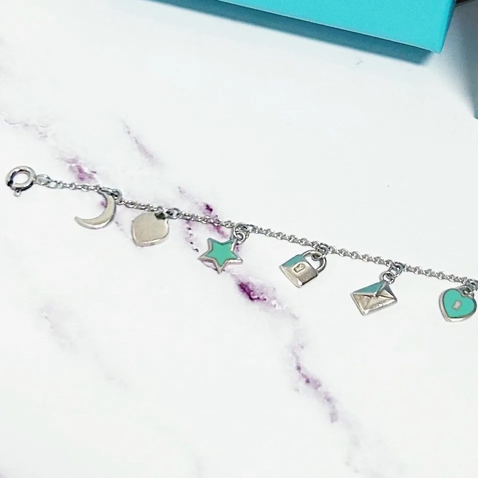Authentic Tiffany & Co. RARE Mini Love Notes 925 Sterling Silver Charm Bracelet - Image 9