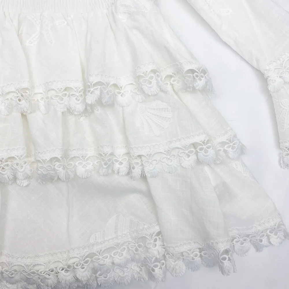 Waimari Calamaro Tiered Ruffle Smocked Beach Coastal Bridal Mini Dress: White - Image 13