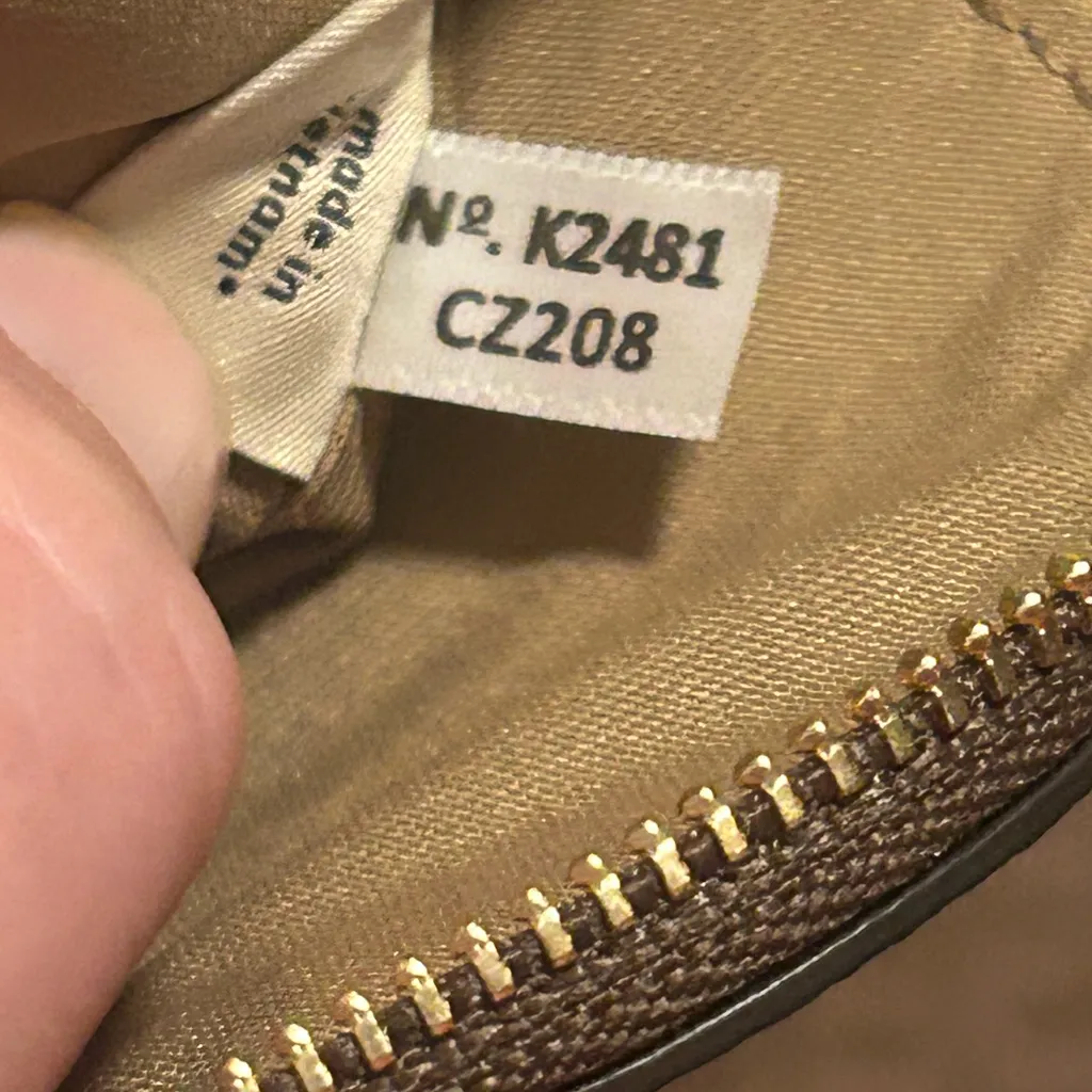 Coach Signature Canvas Circular Coin Pouch bag charm in the color khaki brown - Image 10