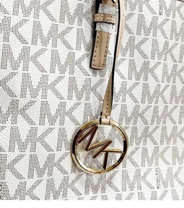 Michael Kors Jet Set Travel Leather Trim Tote Bag in Vanilla
NWT - Image 10