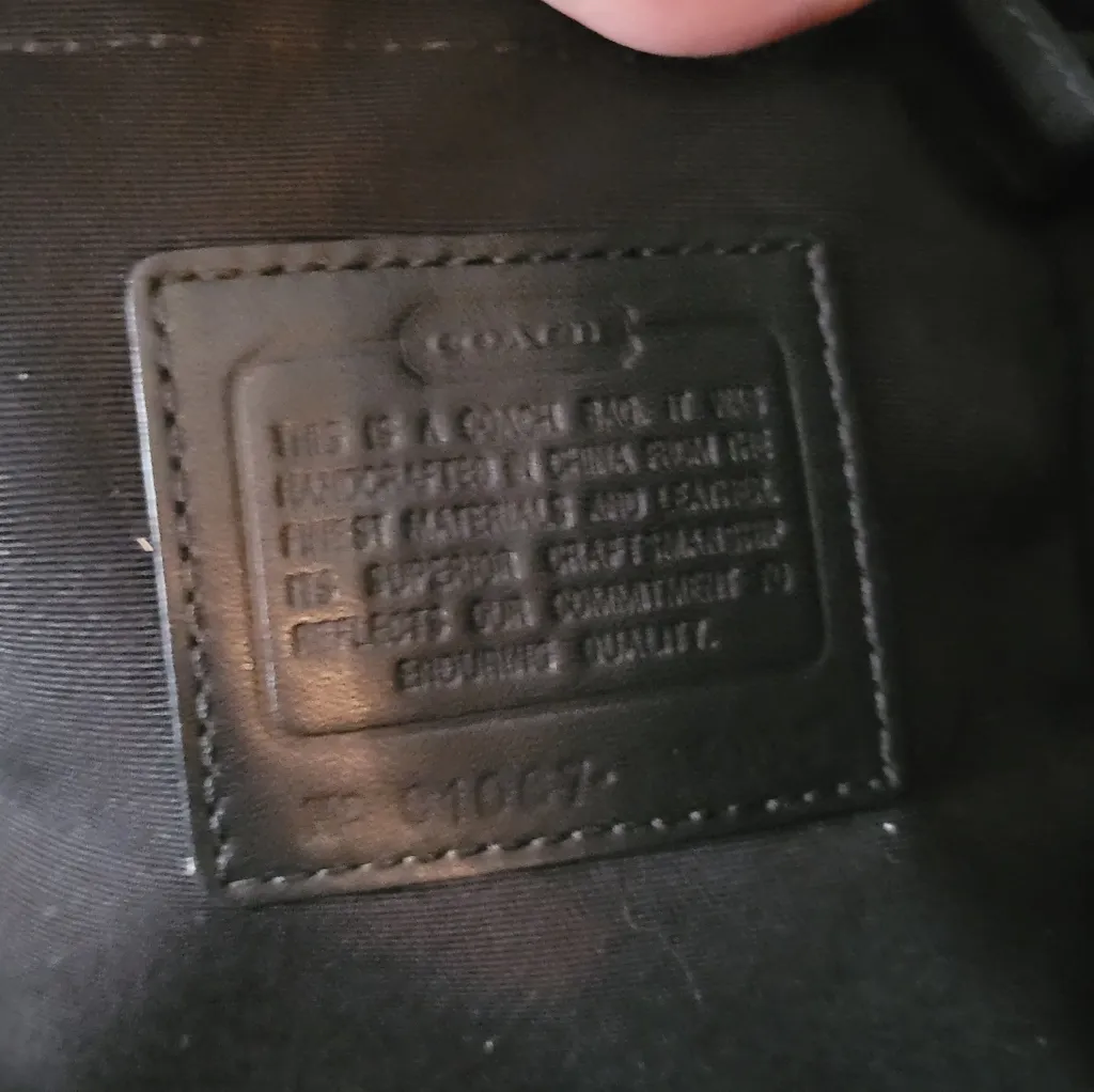 Coach Penelope Op Art Signature PVC Weekender Carry-On Tote in black and white. - Image 8