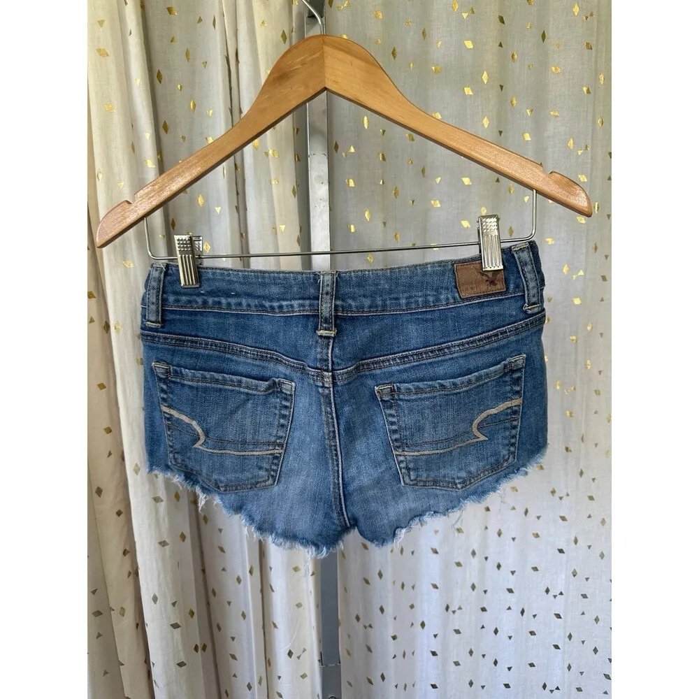 American Eagle Women's Embellished Rhinestones Raw Hem Faded Denim Shorts 0 - Image 3