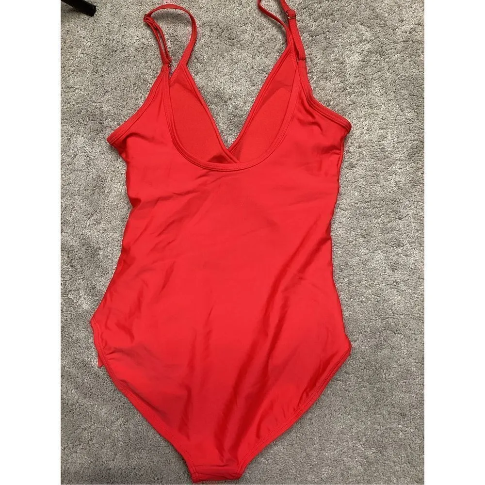 New. Red ruffle one piece. Retails $115 Red - Image 9