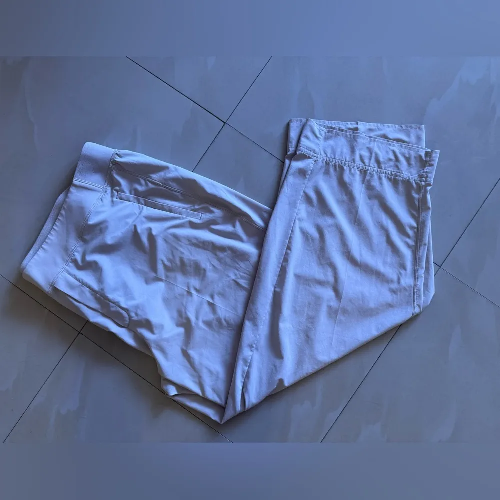 Athleta straight-leg joggers in size 18. These pants have a relaxed fit, a wide - Image 8