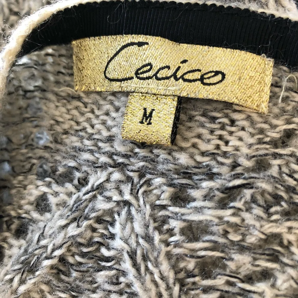 Cecico high low sweater black front beige back - Image 4