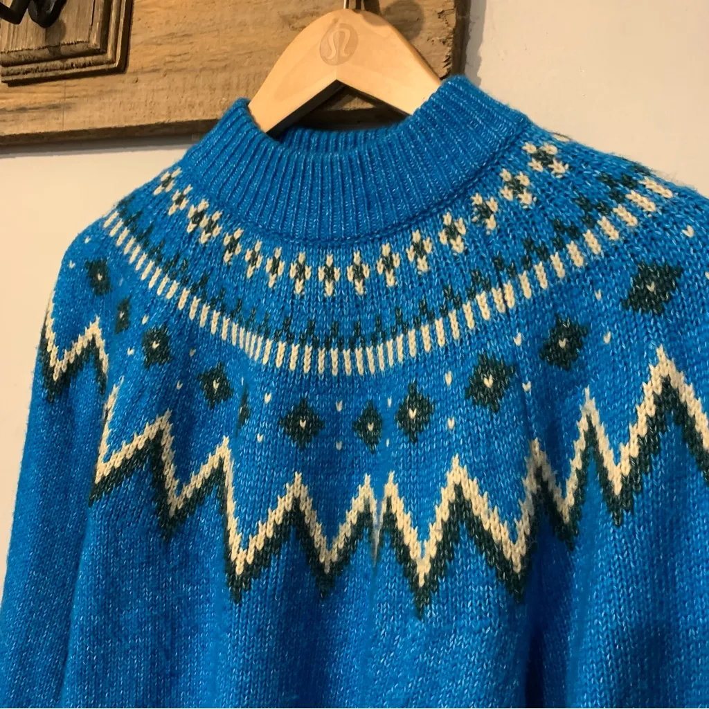 A Royal Christmas on Ice 2022 Anna Marie Blue Sweater who what wear - Image 4